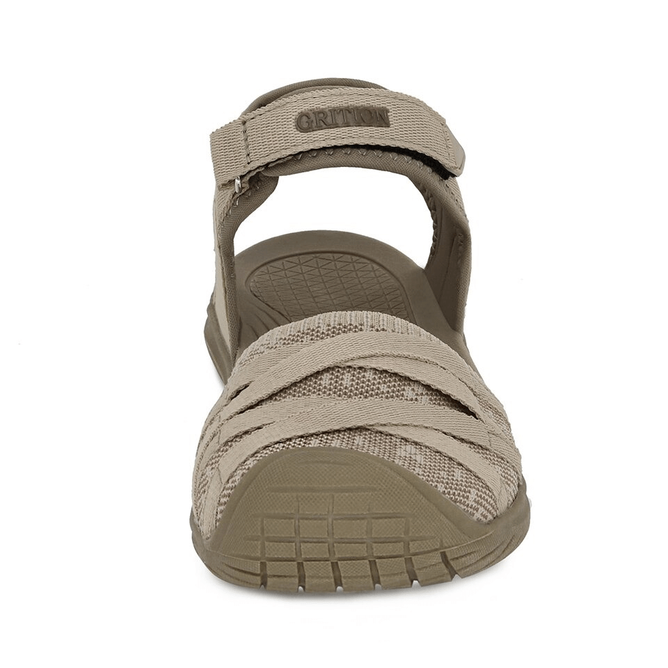 Tan casual closed toe flat sandals with hook & loop closure and textured sole, ideal for trekking and daily wear.